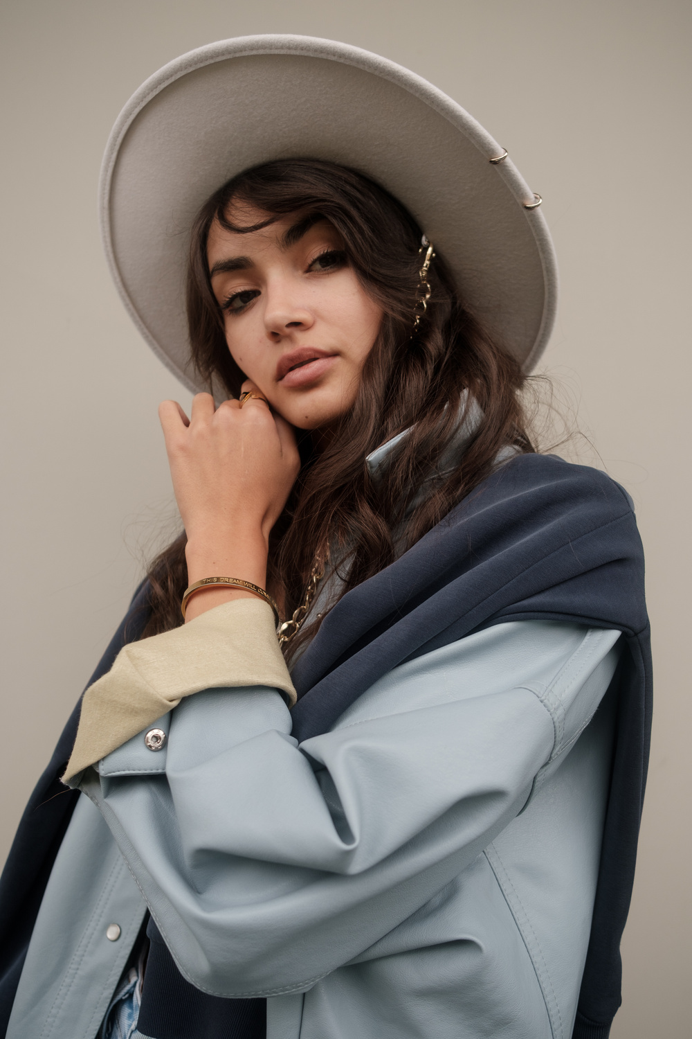 Portrait of Fashionable Girl in White Hat 